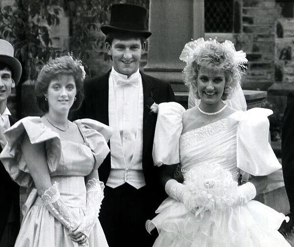 Manchester United footballer Norman Whiteside with his bride on their wedding day