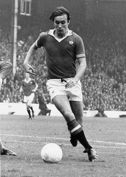 Manchester United footballer Sammy McIlroy on the ball during the League Division One