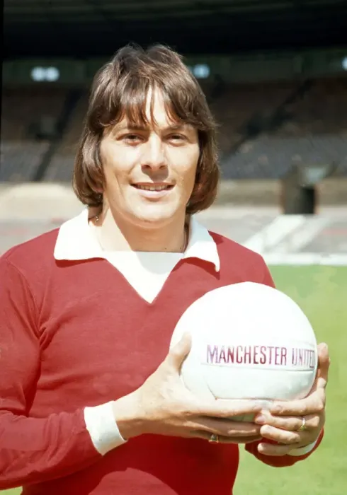 Framed Print : Manchester United footballer Stuart Pearson poses with the team football at Old Trafford Framed Print : Manchester United footballer Stuart Pearson poses with the team football at Old Trafford