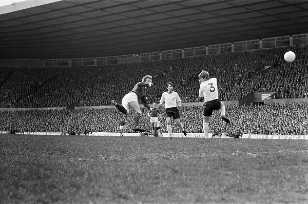 Manchester United forward Denis Law scores the winning goal with a flying header during