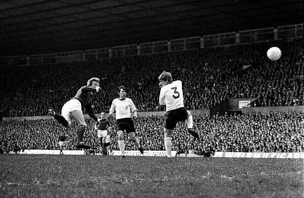 Manchester United forward Denis Law scores the winning goal with a flying header during