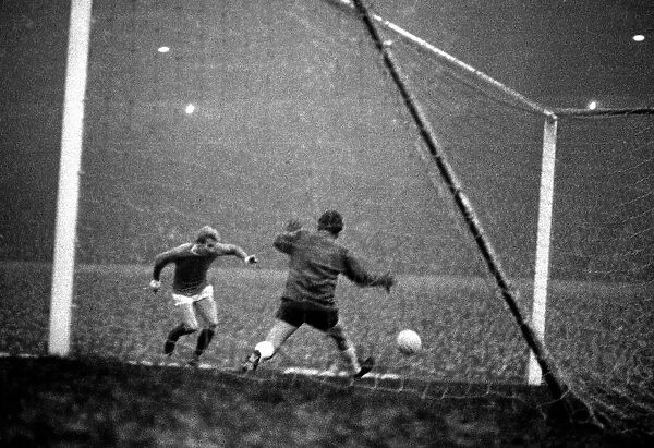 Manchester United forward Denis Law scores the game