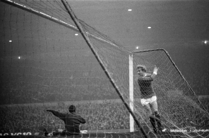 Framed Print : Manchester United forward Denis Law in the back of the Liverpool goal after scoring Framed Print : Manchester United forward Denis Law in the back of the Liverpool goal after scoring