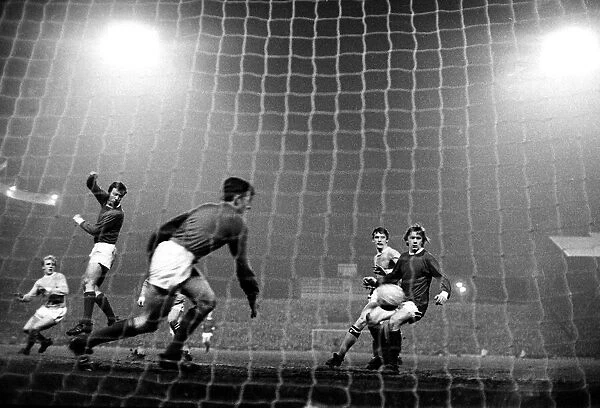 Manchester United goalkeeper Alec Stepney races across his goal during a Manchester City