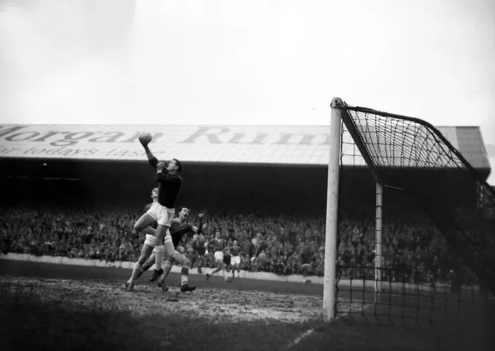 Framed Print : Manchester United goalkeeper Harry Gregg leaps high to catcha cross from the wing from in Framed Print : Manchester United goalkeeper Harry Gregg leaps high to catcha cross from the wing from in