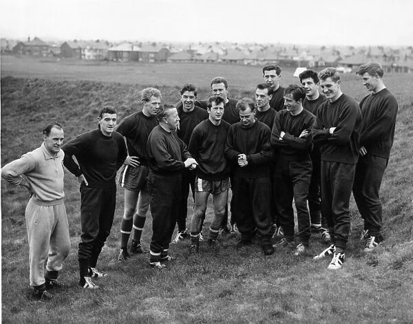 Manchester United. Jimmy Murphy with his Wembley team prior to training at Blackpool