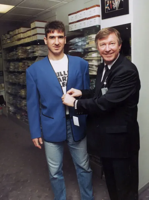 Framed Print : Manchester United manager Alex Ferguson with Eric Cantona in a clothes shop Framed Print : Manchester United manager Alex Ferguson with Eric Cantona in a clothes shop