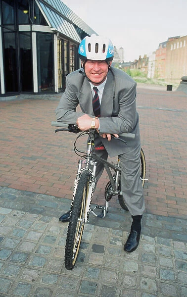 Manchester United manager Alex Ferguson pictured on a mountain bike after opening the new