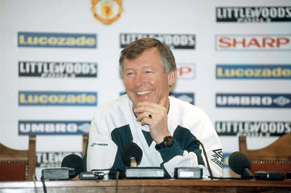 Manchester United manager Alex Ferguson in relaxed mood during a tpress conference at Old
