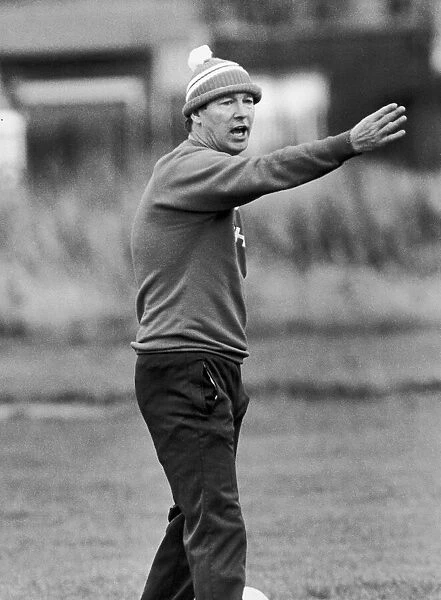 Manchester United manager Alex Ferguson takes charge of a training session