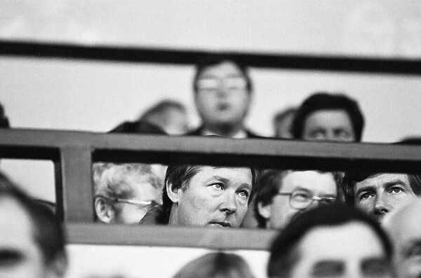 Manchester United manager Alex Ferguson watches his side in action against Norwich City