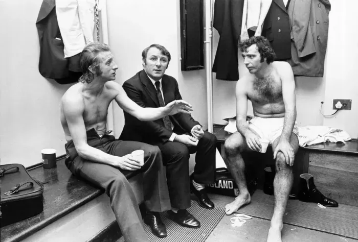 Framed Print : Manchester United manager Tommy Docherty with players Denis Law (left Framed Print : Manchester United manager Tommy Docherty with players Denis Law (left