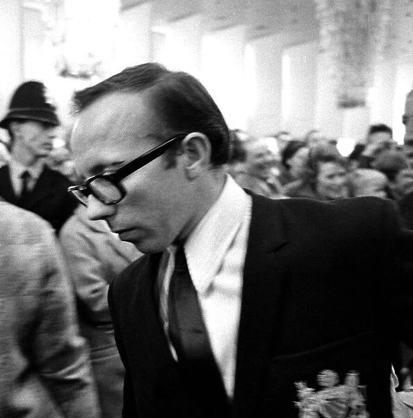 Manchester United playerNobby Stiles on arrival ar Ringway Airport