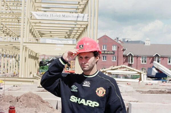 Manchester United players at the building site of their new hotel