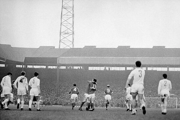 Manchester United players celebrate a goal by George Best against Real Madrid in