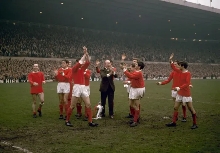 Framed Print : Manchester United players celebrate their League Championship win with manager Matt Busby