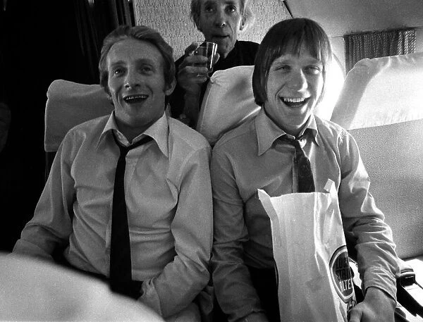 Manchester United players Denis Law and John Fitzpatrick returning from Milan April