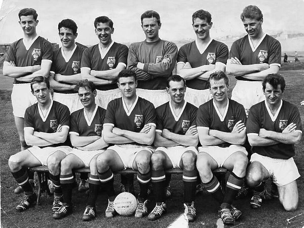 Manchester United pose for a team group photograph before the 1960-61 season Left