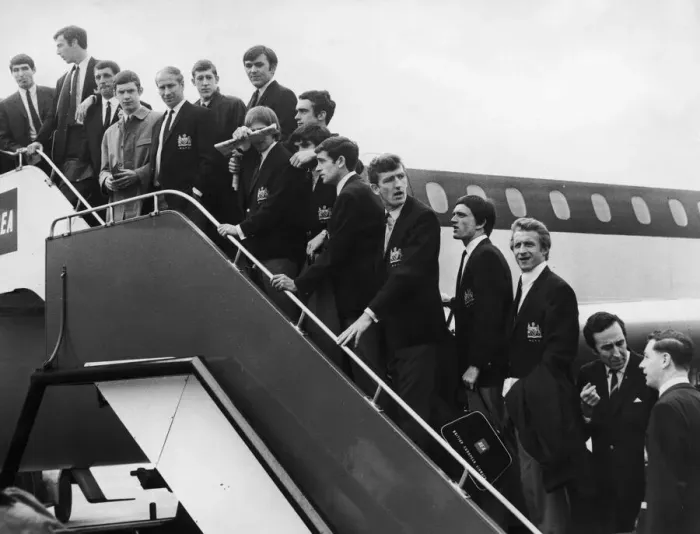 Framed Print : Manchester United seen here boarding a plane at Manchester Ringway airport for their Framed Print : Manchester United seen here boarding a plane at Manchester Ringway airport for their