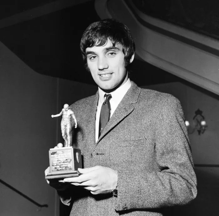 Framed Print : Manchester United star George Best holding his Footballer of the Year trophy Framed Print : Manchester United star George Best holding his Footballer of the Year trophy