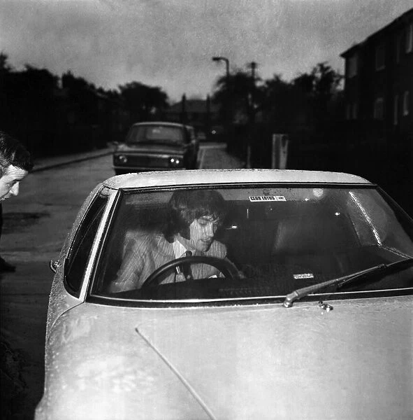 Manchester United star George Best leaving the house to go to the match against