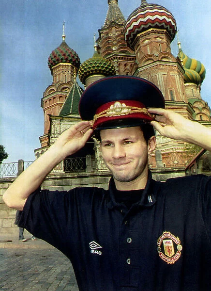 Manchester United star Ryan Giggs poses wearing Russian military hat in front of St