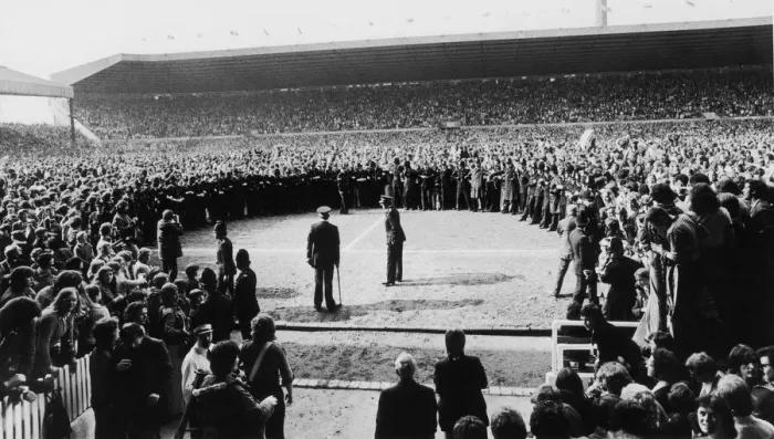 Framed Print : Manchester United supporters crowd onto the pitch at Old Trafford to celebrate their