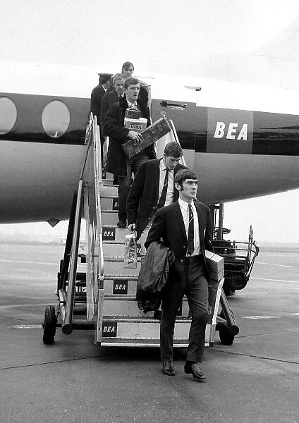 Manchester United team arrive at Ringway Airport from Brussels via London December