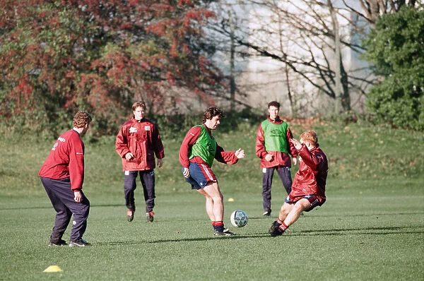 Manchester United in training. Roy Keane and Paul Scholes practicing watched by