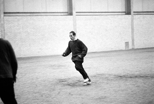 Manchester United Training Wilf Mcguiness - trainer in action. February 1969