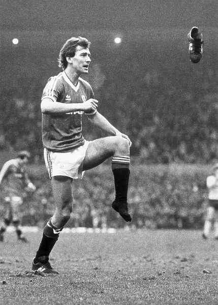 Manchester United v. Arsenal. OPS Bryan Robson loses his boot after scoring