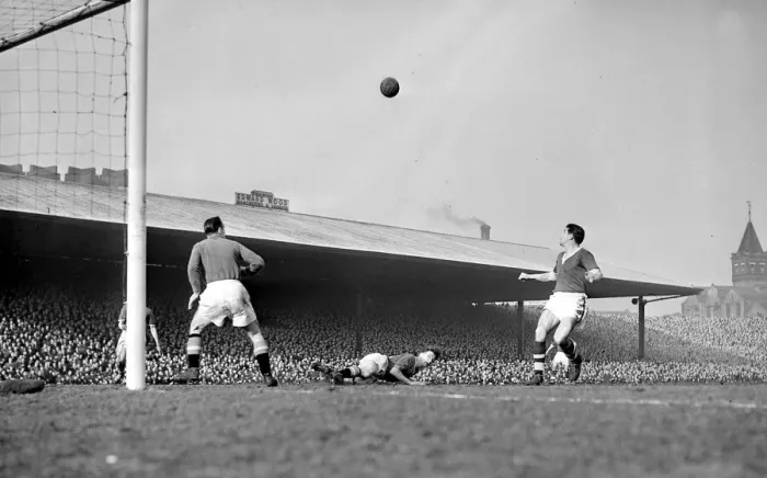 Framed Print : Manchester United versus Cardiff City Roger Byrne heads almost into his own goal Framed Print : Manchester United versus Cardiff City Roger Byrne heads almost into his own goal