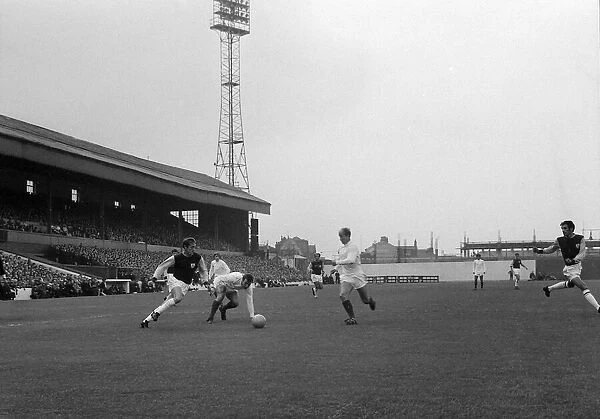 Manchester Uniteds Bobby Charlton causes problems for the Burnley defence during