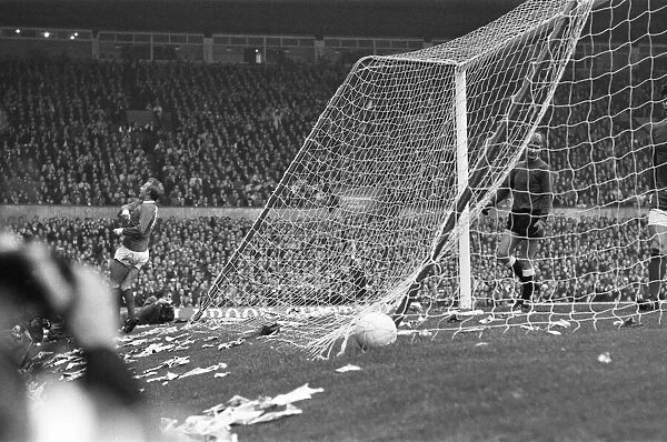 Manchester Uniteds Denis Law celebrates behind the goal after scoring past dejected