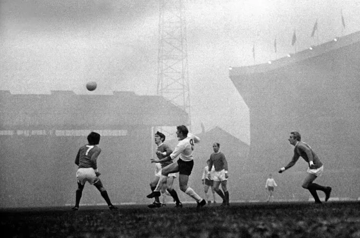 Framed Print : Manchester Uniteds George Best, Francis Burns and Bobby Charlton watch the ball as Framed Print : Manchester Uniteds George Best, Francis Burns and Bobby Charlton watch the ball as