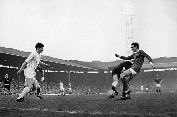 Manchester Uniteds John Aston causes problems for the vReal Madrid defence during