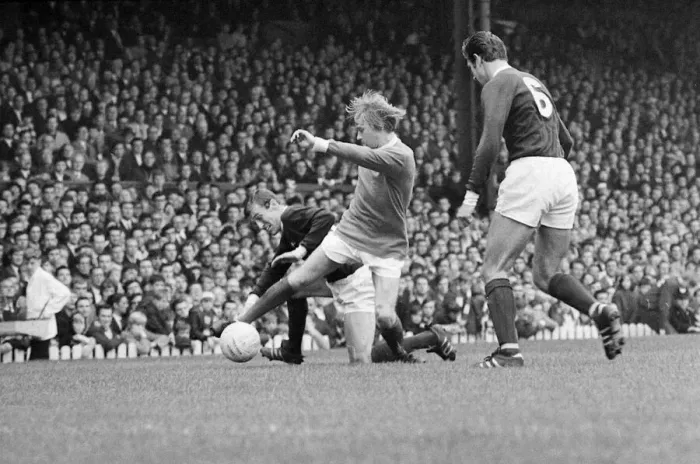 Framed Print : Manchester Uniteds John Fitzpatrick goes in for a challenge during the league match