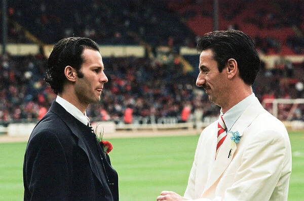Manchester Uniteds Ryan Giggs (left) comes face to face with Liverpool