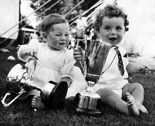Mandy Turnbull (left) and Roger O Brien proudly display the trophies which prove