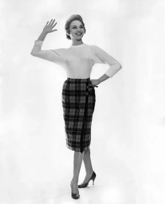 Framed Print : Maniquinn modelling tartan full length skirt and sweater. December 1958 P006895 Framed Print : Maniquinn modelling tartan full length skirt and sweater. December 1958 P006895