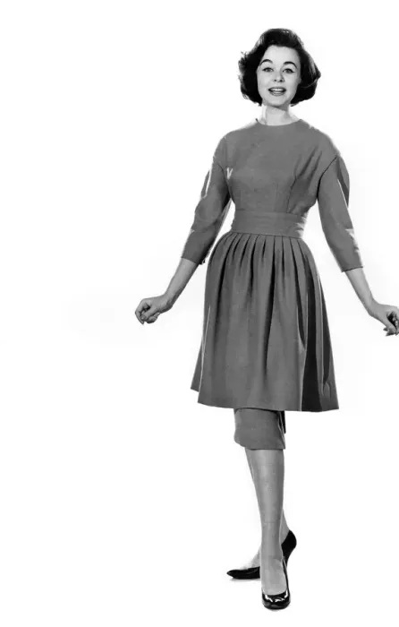 Framed Print : Mannequin Jackie Jackson seen here modeling a summmer dress with matching apron skirt