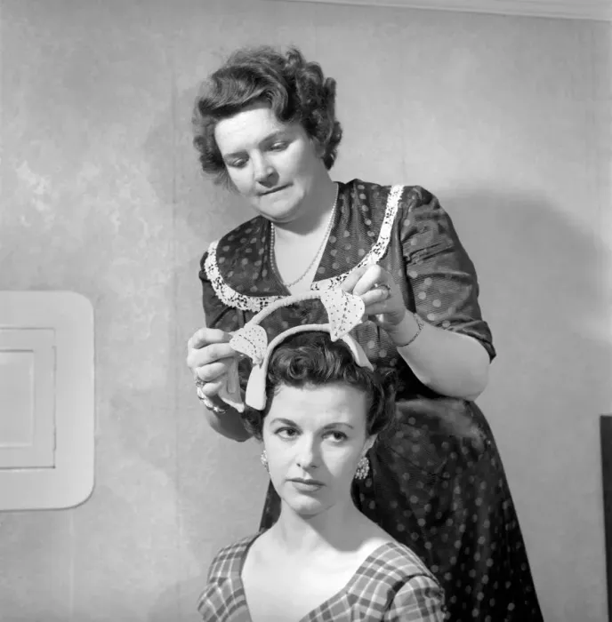 Framed Print : Mannequins modelling the 1956 spring  /  summer hat collection. April 1956