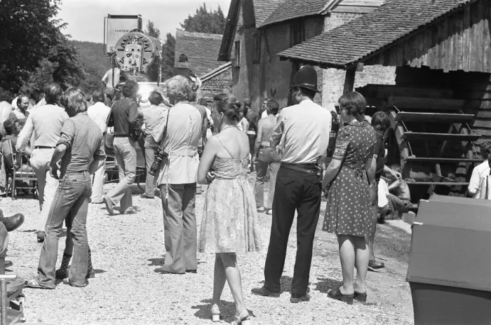 Framed Print : Mapledurham villagers watch on, as the next scene is filmed for The Eagle Has Landed Framed Print : Mapledurham villagers watch on, as the next scene is filmed for The Eagle Has Landed