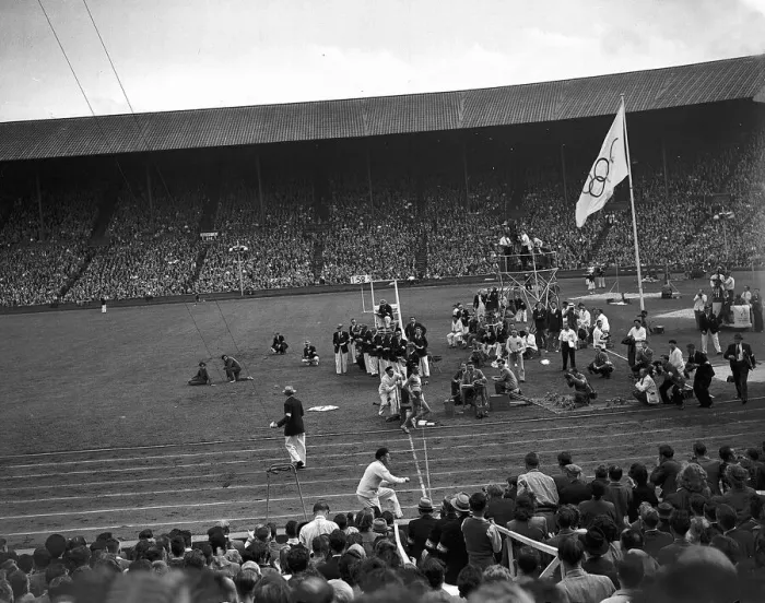 Framed Print : Marathon race runner crosses the finish line August 1948 at Wembley during Framed Print : Marathon race runner crosses the finish line August 1948 at Wembley during
