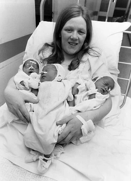 Margaret Asante with newborn children Daniella, Mellissa and Felicity