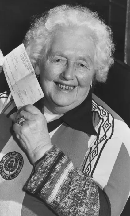 Framed Print : Margaret Cameron, 85, holds up her cheque for !000 after winning the first draw in Framed Print : Margaret Cameron, 85, holds up her cheque for !000 after winning the first draw in