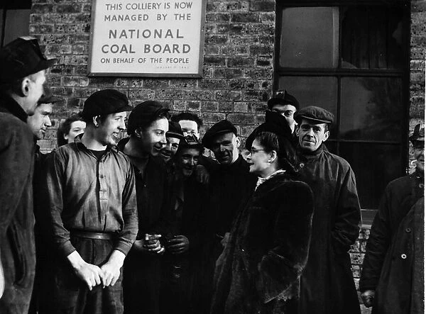 Margaret Herbison Labour MP for North Lanark in fur coat answers questions by miners