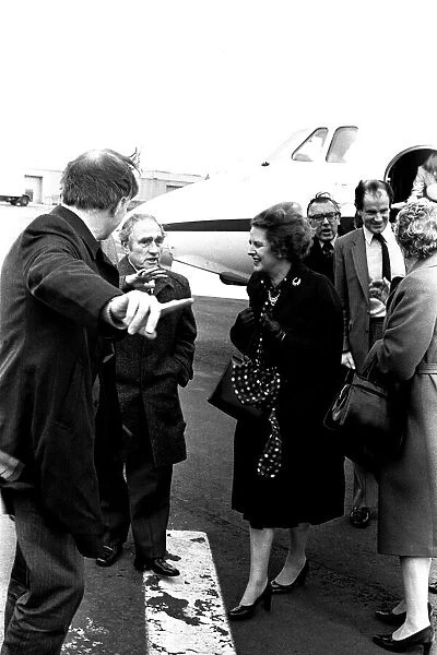 Margaret Thatcher arrives at Newcastle Airport in gale force winds on March 12, 1982