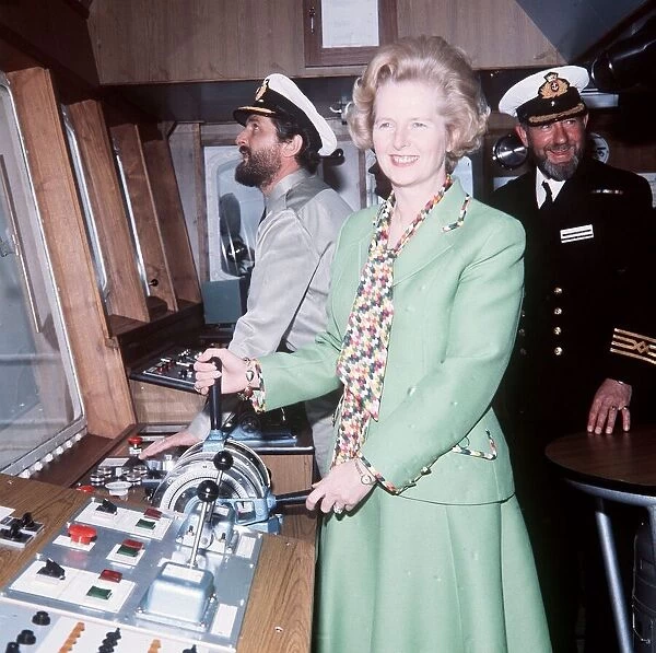 Margaret Thatcher on board Star Taurus ship green suit holding controls