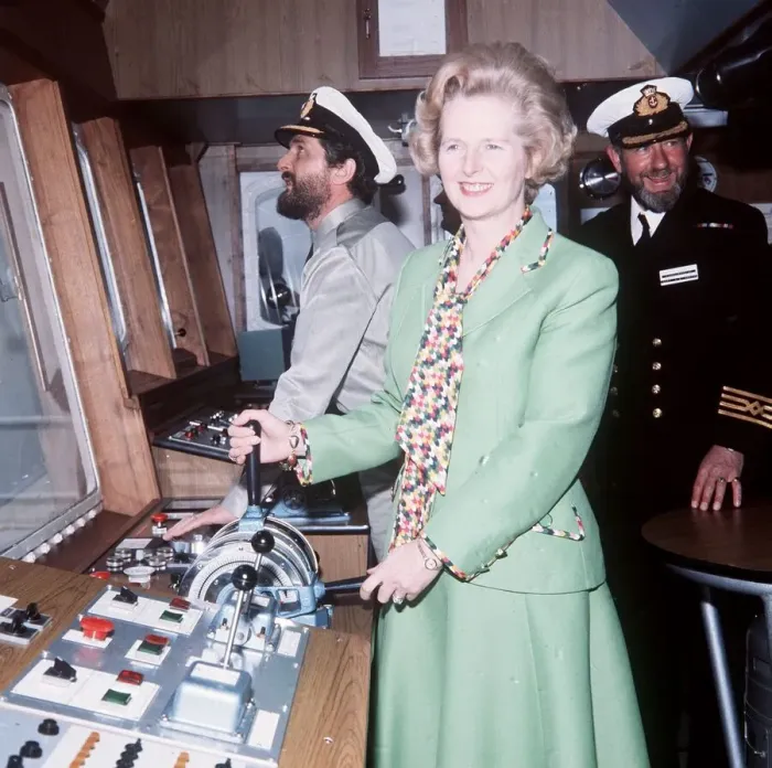 Framed Print : Margaret Thatcher on board Star Taurus ship green suit holding controls